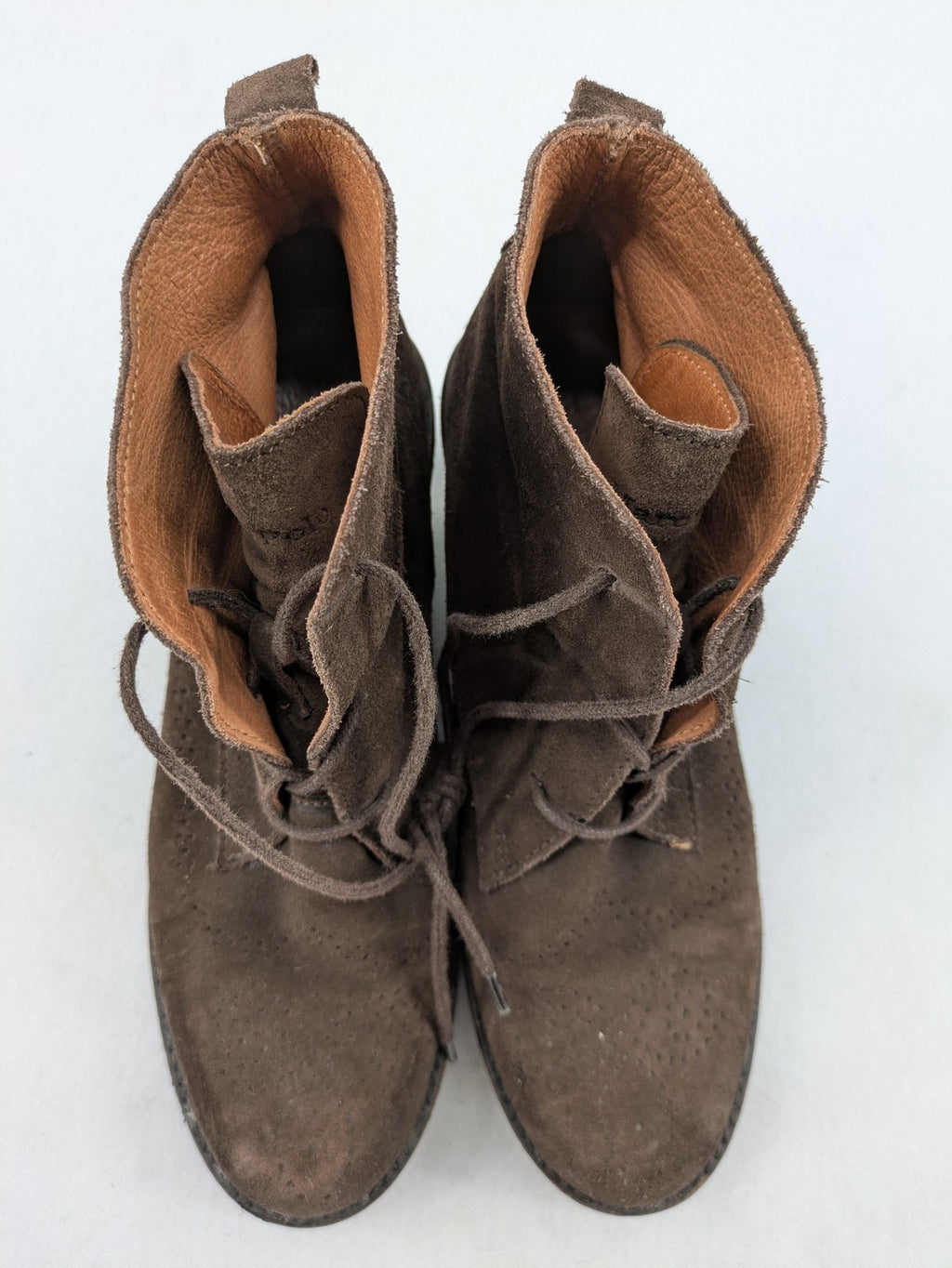 Marc O'Polo brown suede ankle boots with wedge heel and classic lacing.
