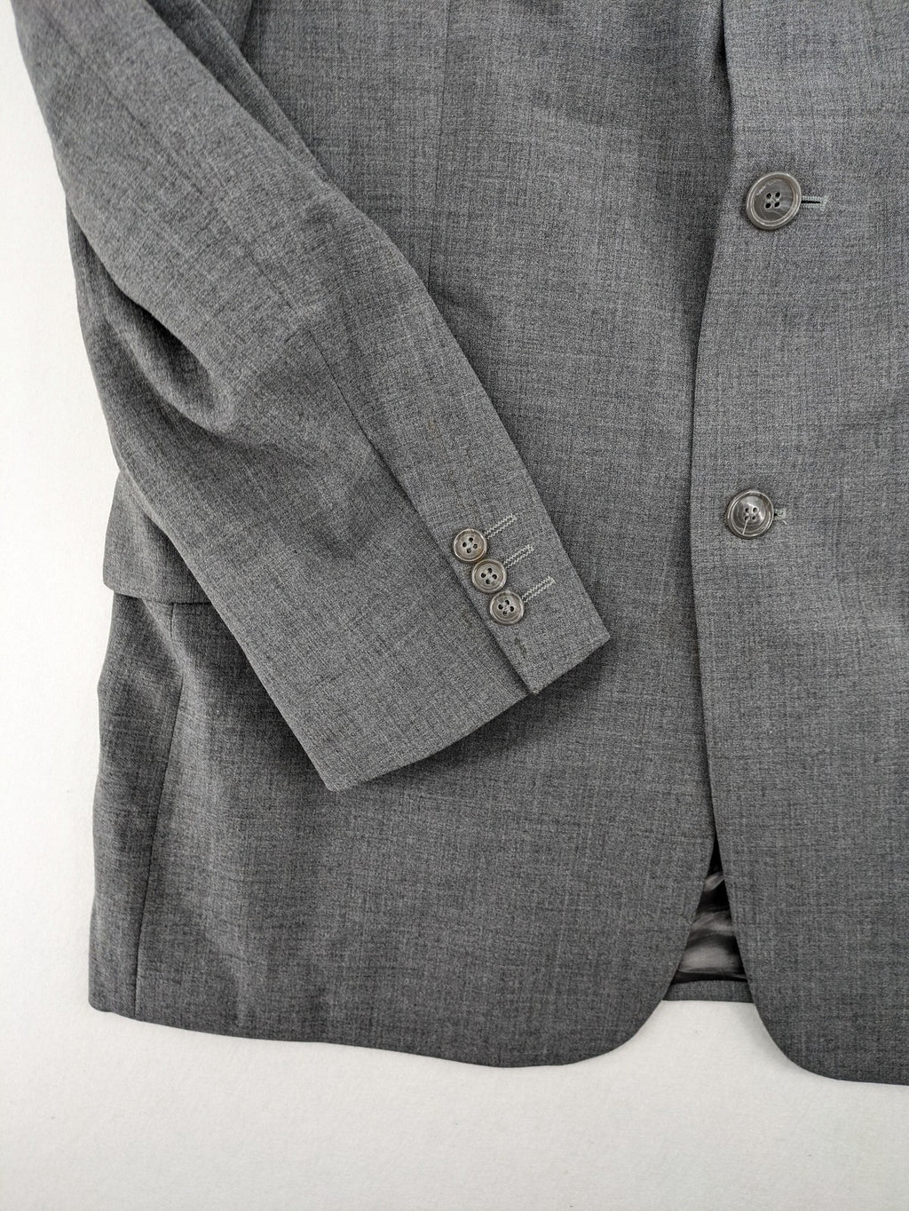 Montego grey blazer three-button design made from wool blend with smooth lining.