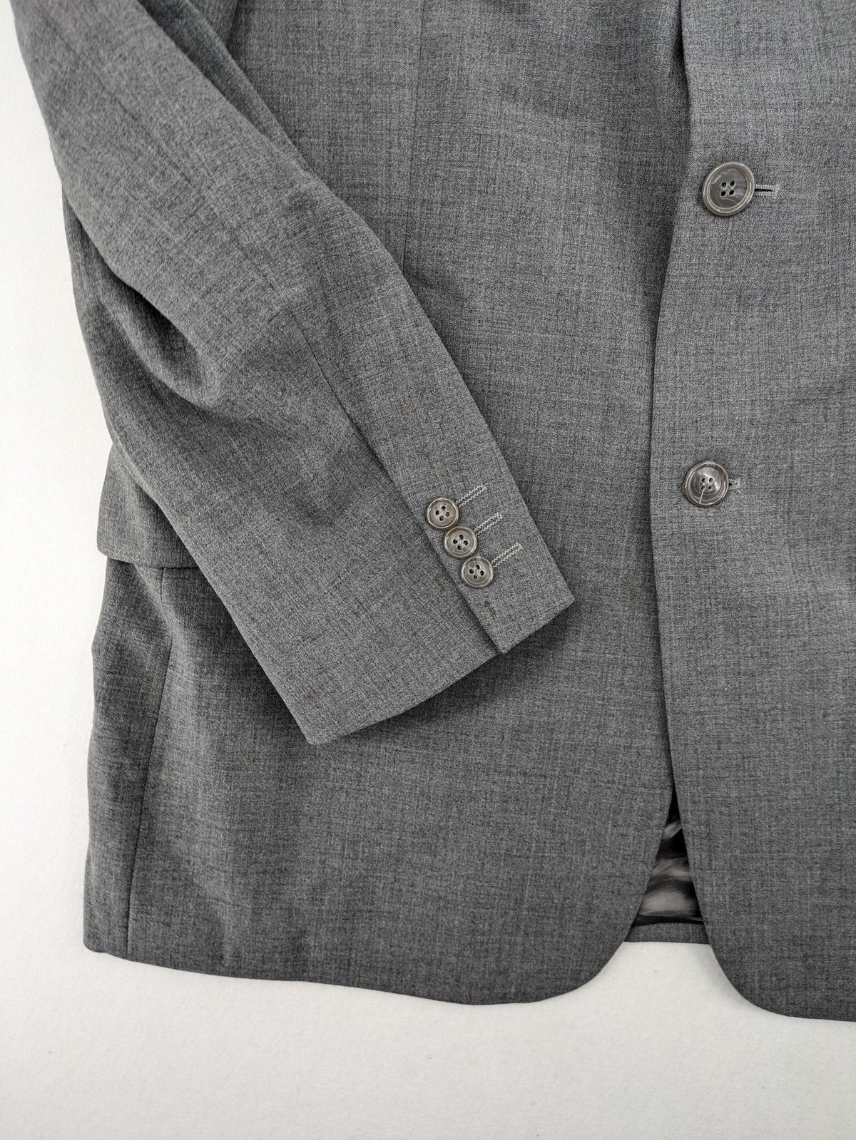 Montego grey blazer three-button design made from wool blend with smooth lining.