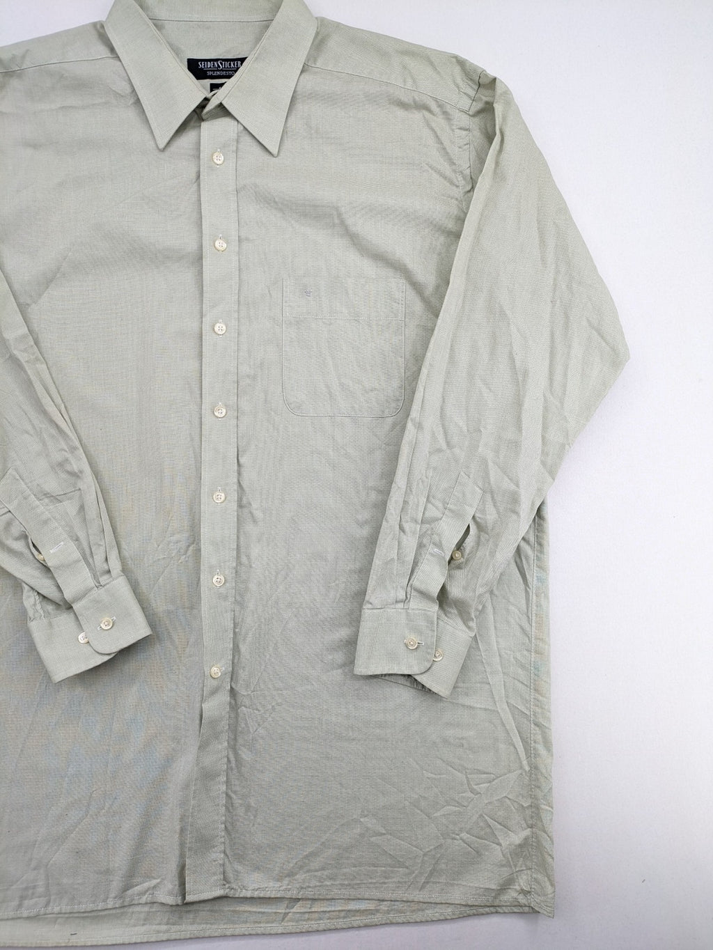 Seidensticker grey button-up shirt with subtle pattern and embroidered logo on pocket.