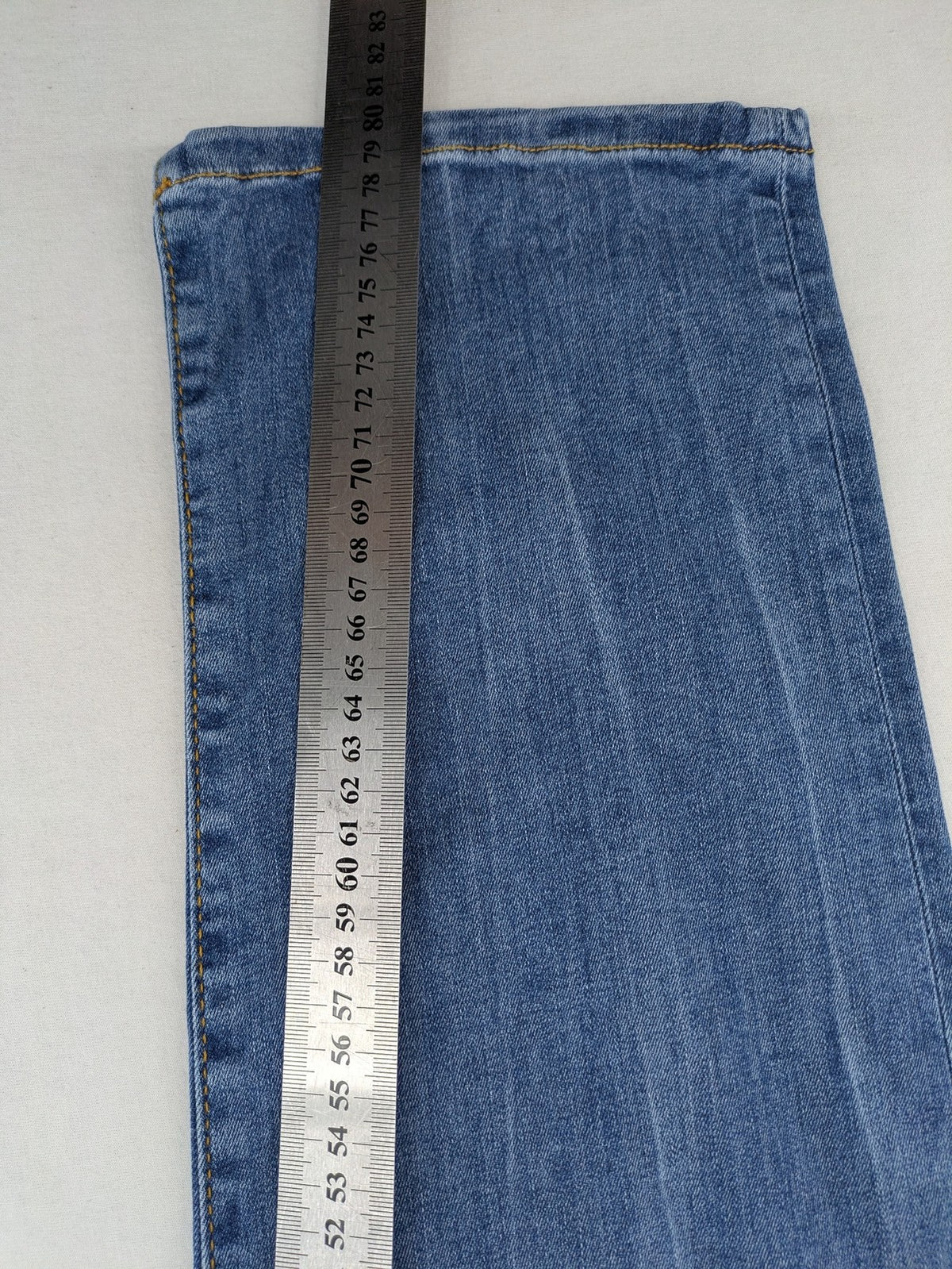 Drykorn blue straight jeans with stretch denim, classic fit, and logo patch on waistband.
