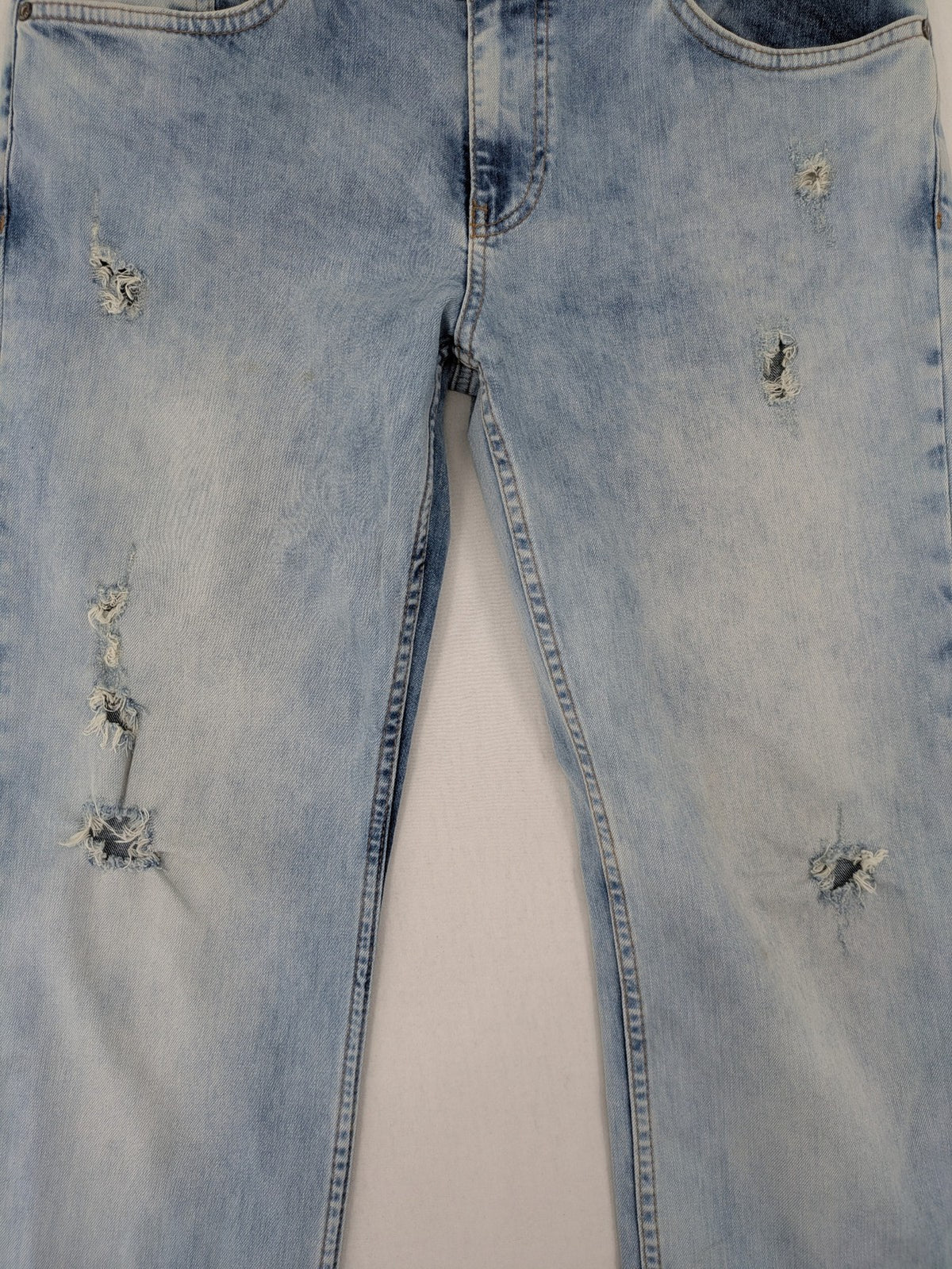 Koton Jeans blue straight jeans with distressed details and classic 5-pocket style.