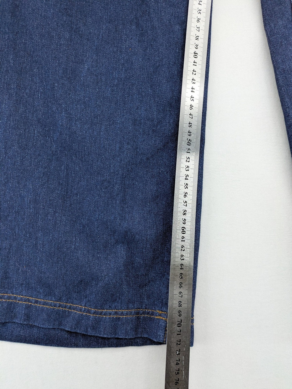 Emery Rose pink culotte pants with wide legs, double button closure, and soft denim blend.
