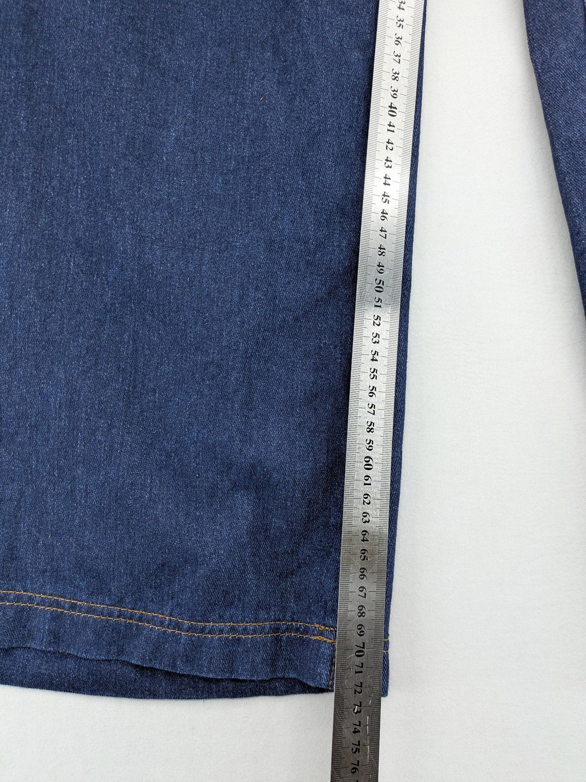 Emery Rose pink culotte pants with wide legs, double button closure, and soft denim blend.
