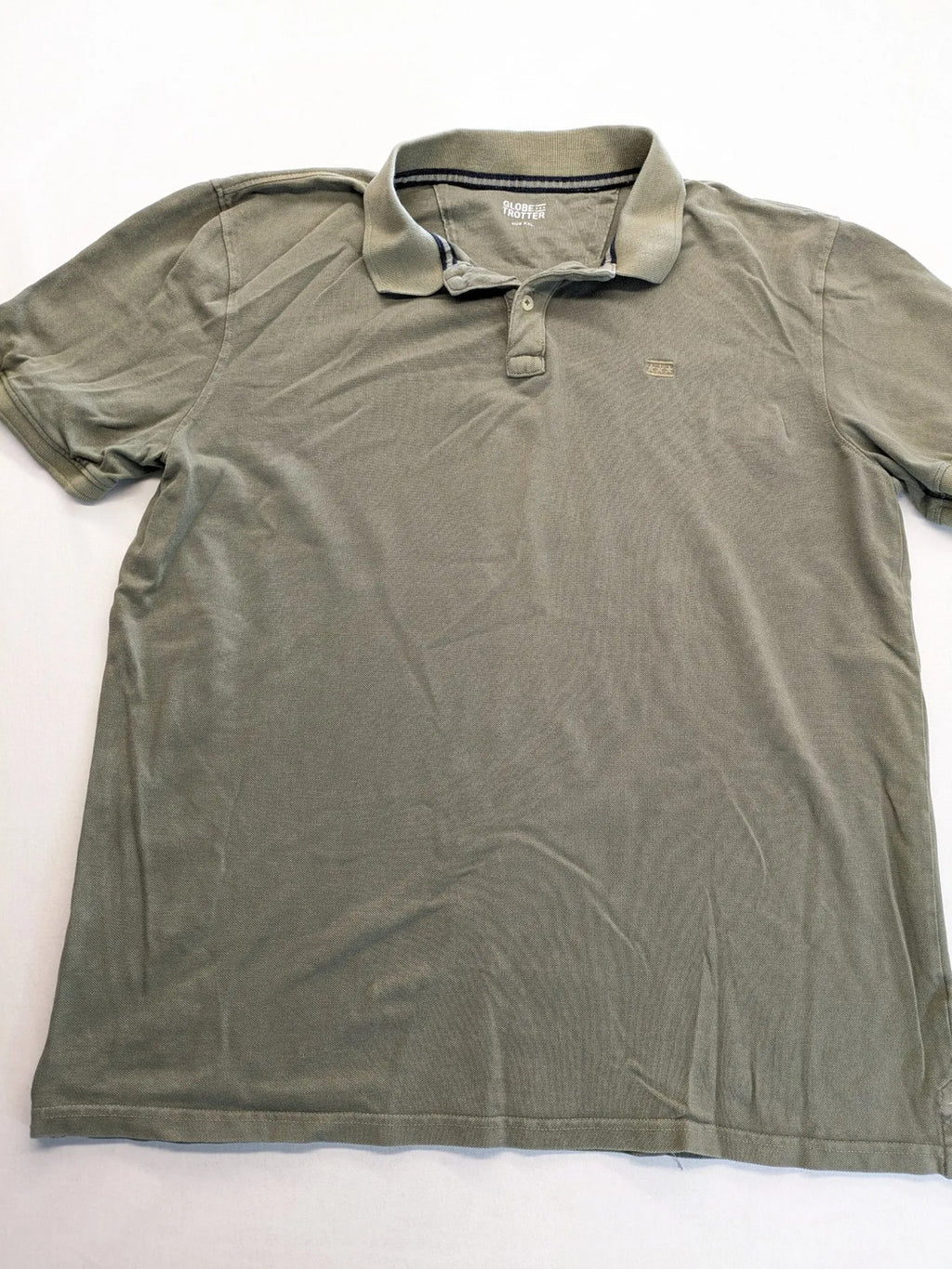 Globe-Trotter beige khaki polo shirt with classic collar and small chest logo.