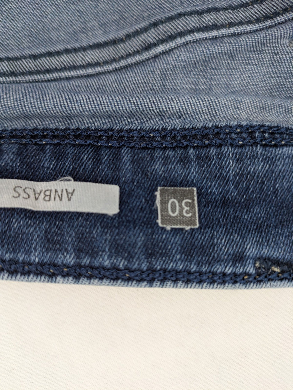 Replay slim fit jeans blue with subtle fading and stretch denim material.