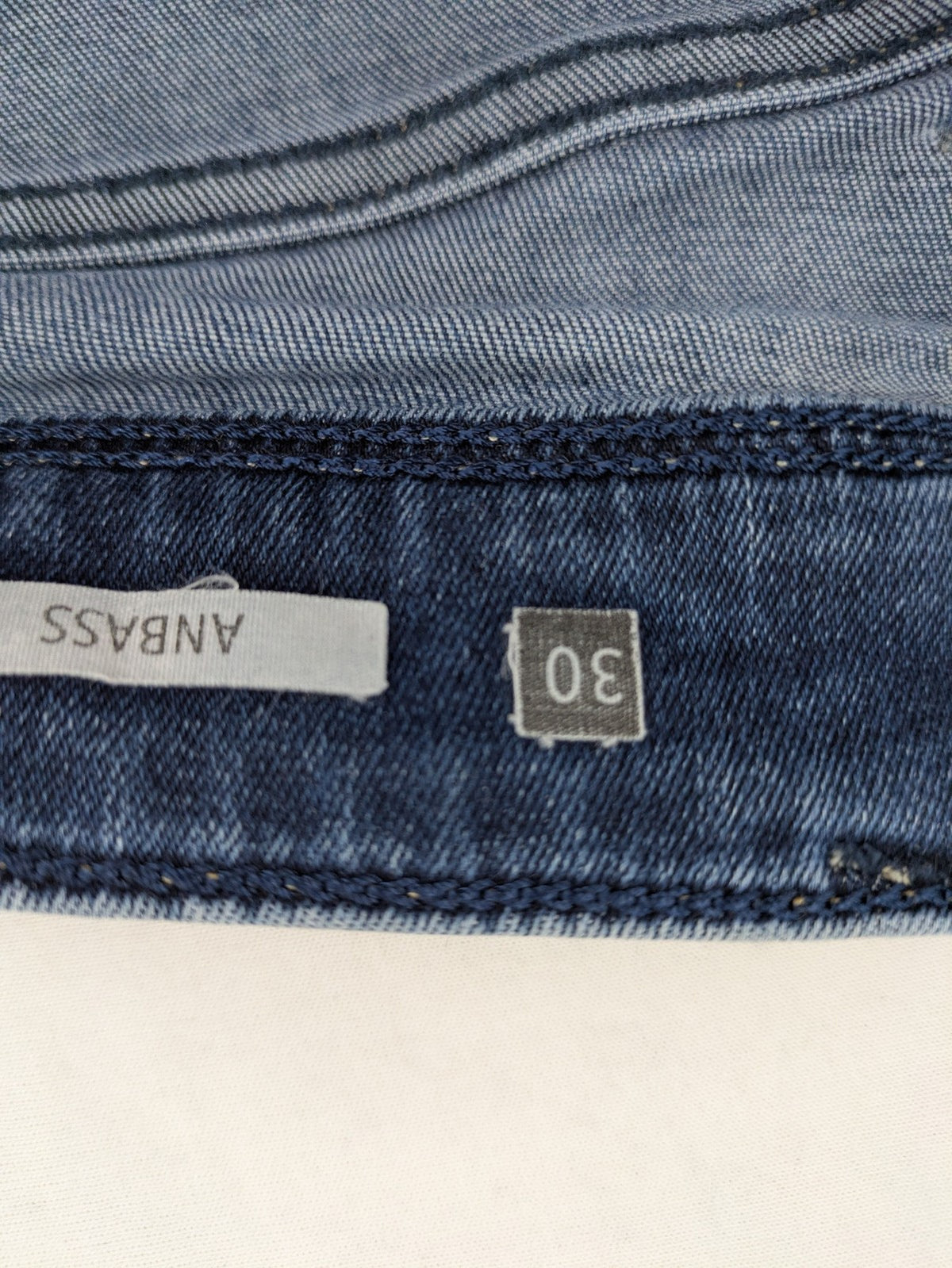 Replay slim fit jeans blue with subtle fading and stretch denim material.