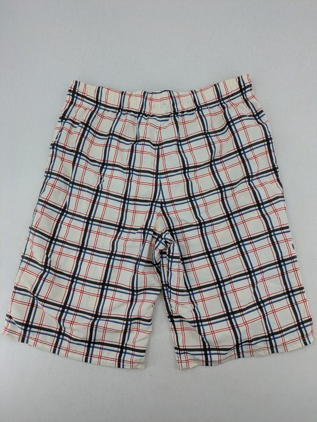 Crivit multi-coloured board shorts with classic check pattern and adjustable drawstring waistband.