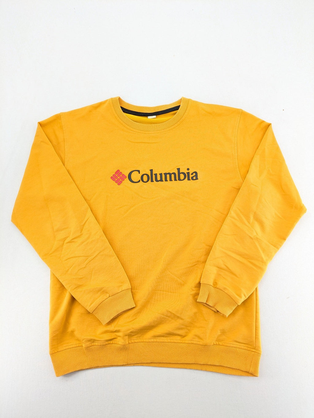 Columbia yellow turtle neck jumper with iconic logo, ribbed cuffs, and soft cotton material.