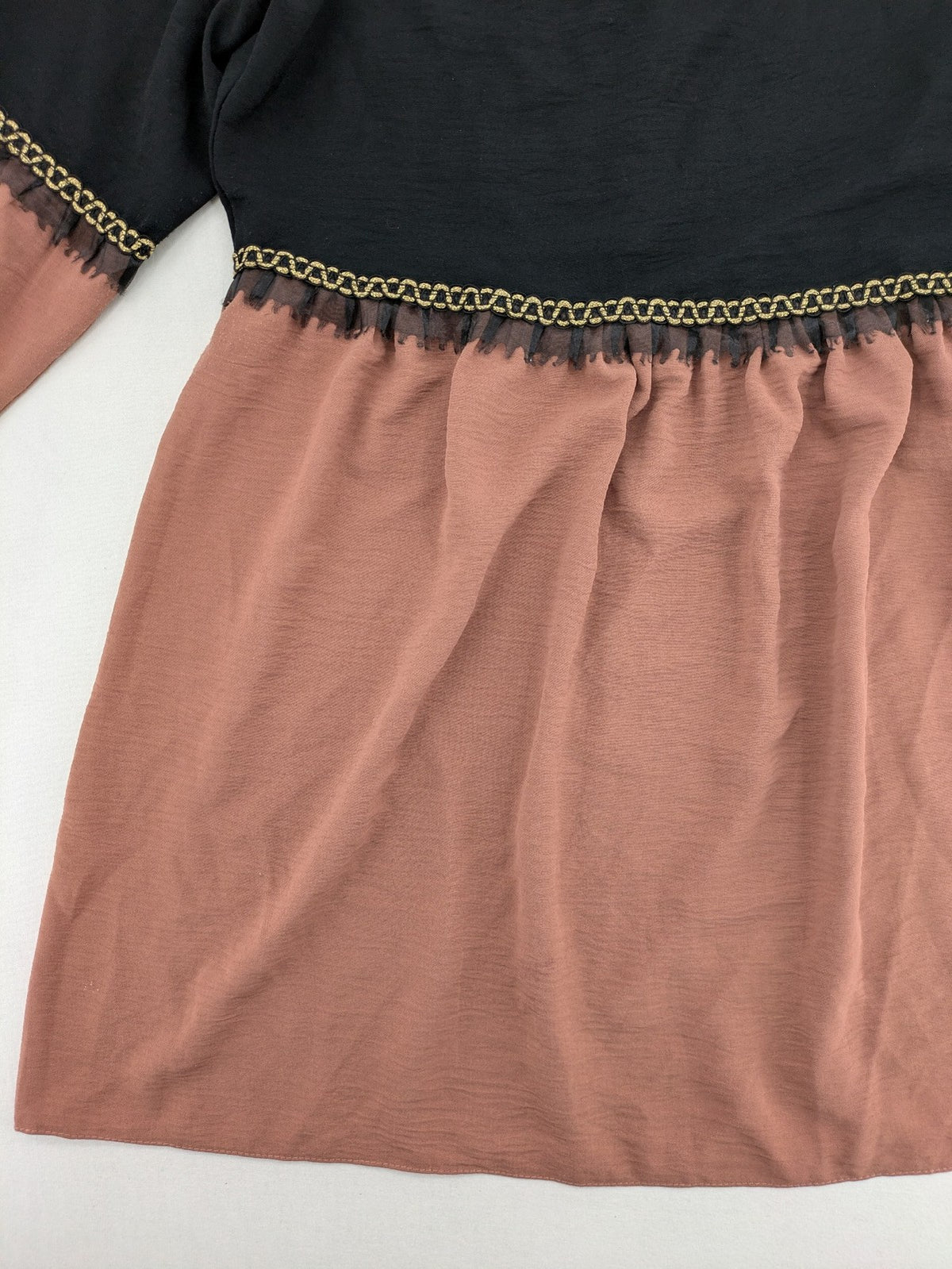 Efsun Moda grey and pink A-line dress with gold decorative chains and long balloon sleeves.