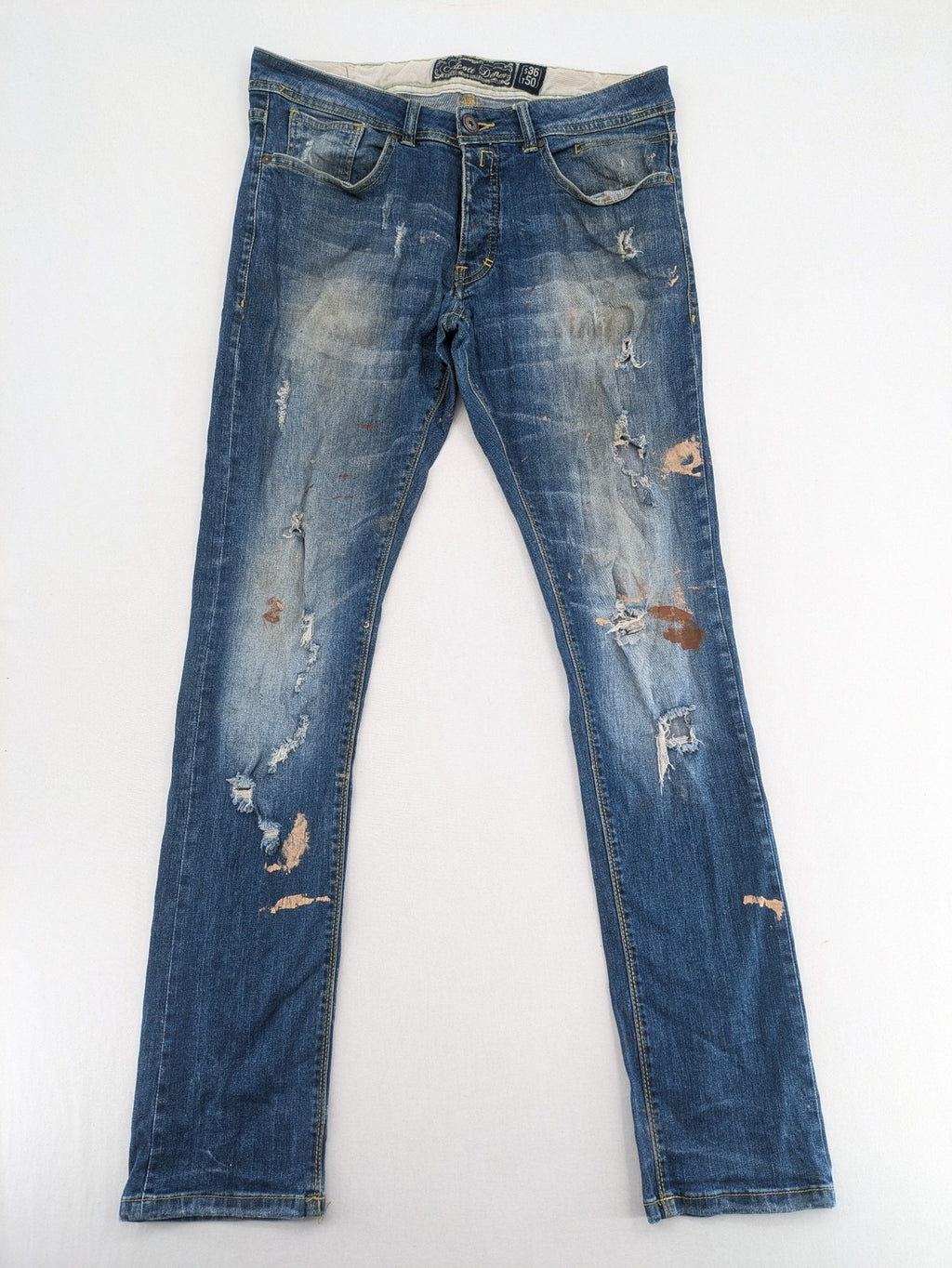 alcott skinny fit jeans blue distressed with button fly and strong wash details