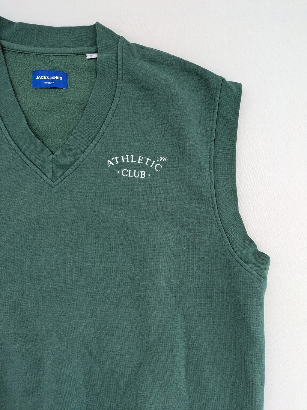 Jack & Jones Originals green vest with embroidered Athletic Club 1990 logo and V-neck.