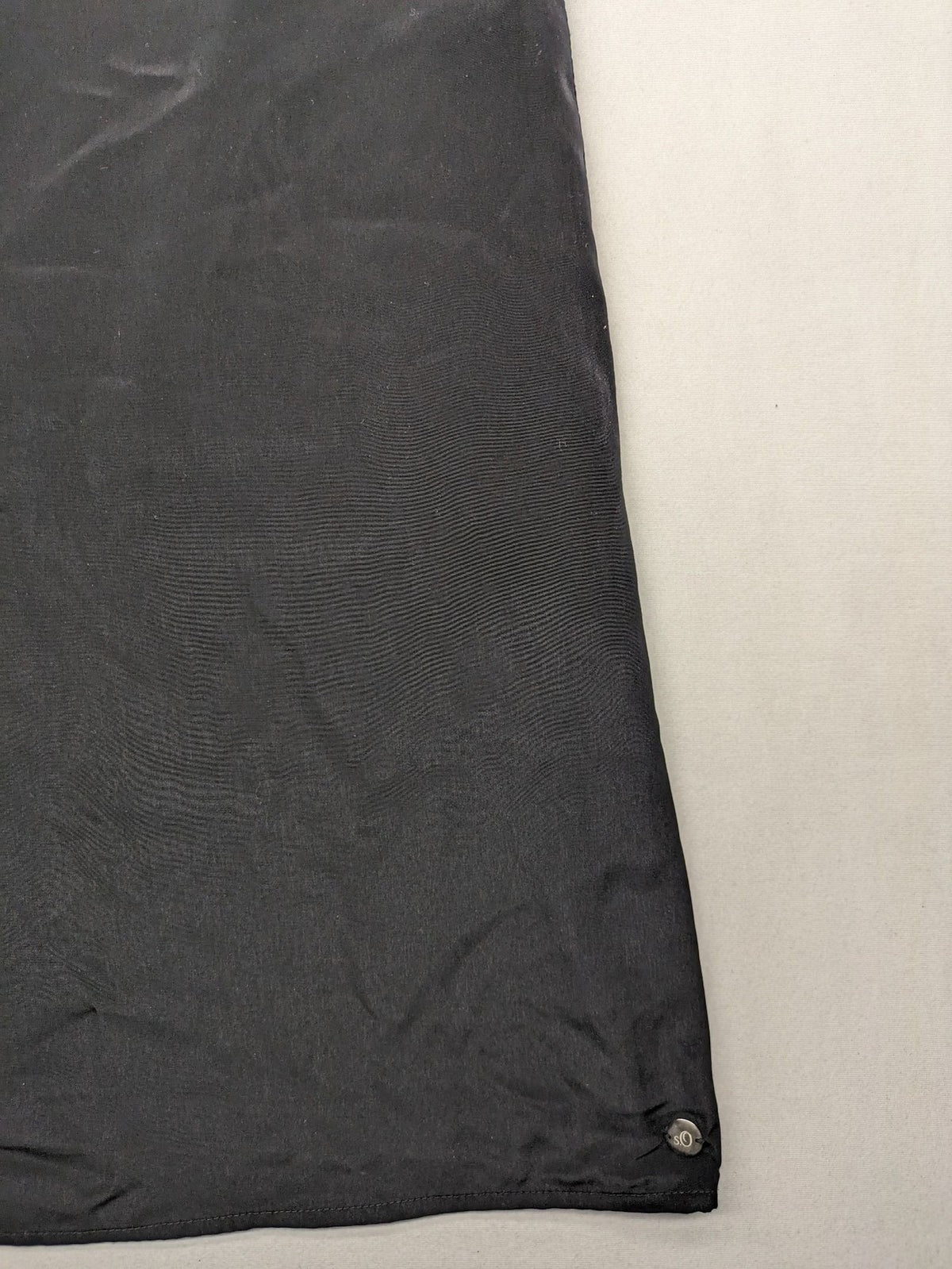 s.Oliver black shift dress with intricate cut-out pattern and keyhole neck detail.