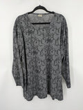 Yessica grey black floral pattern tunic top with round neckline and long sleeves.