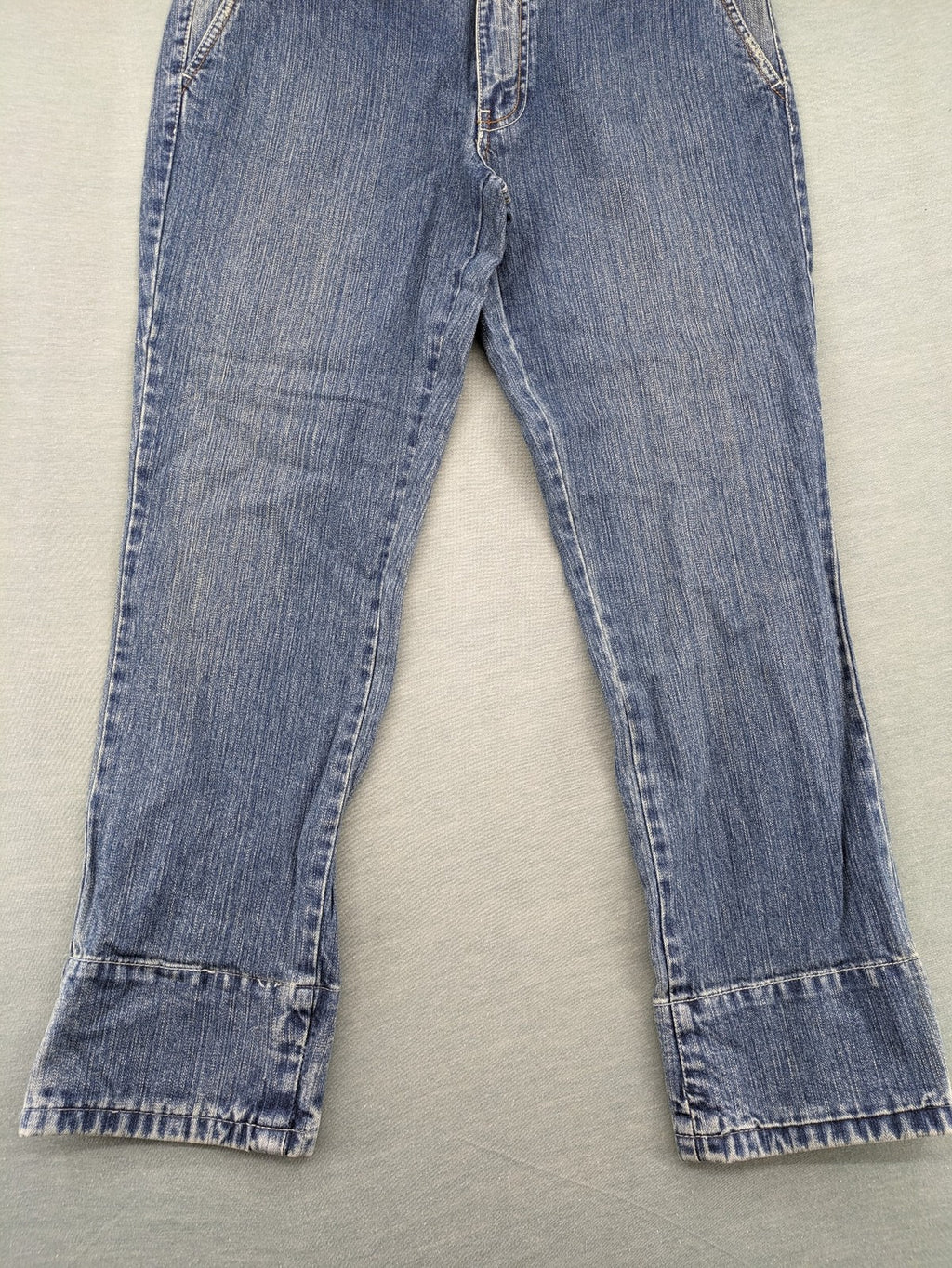 Stefanel blue straight jeans with cuffed hem and classic 5-pocket design.