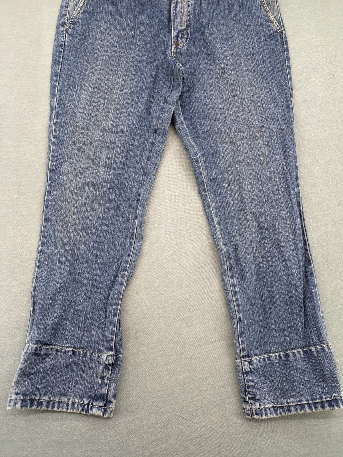 Stefanel blue straight jeans with cuffed hem and classic 5-pocket design.