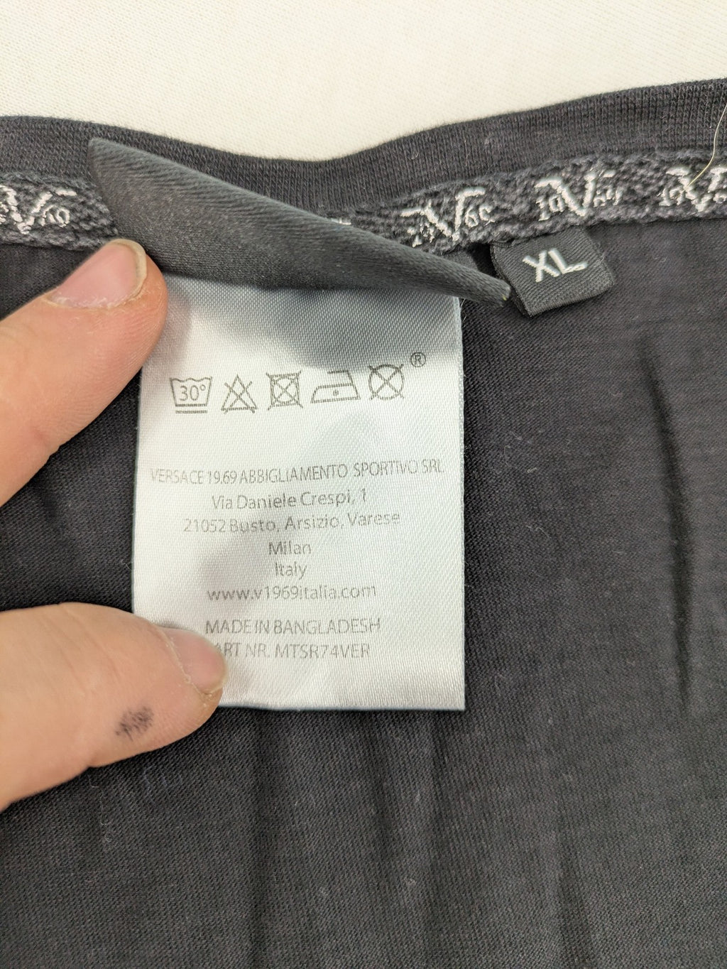 Versace 19.69 black short sleeve t-shirt with graphic logo print and V-neck design.