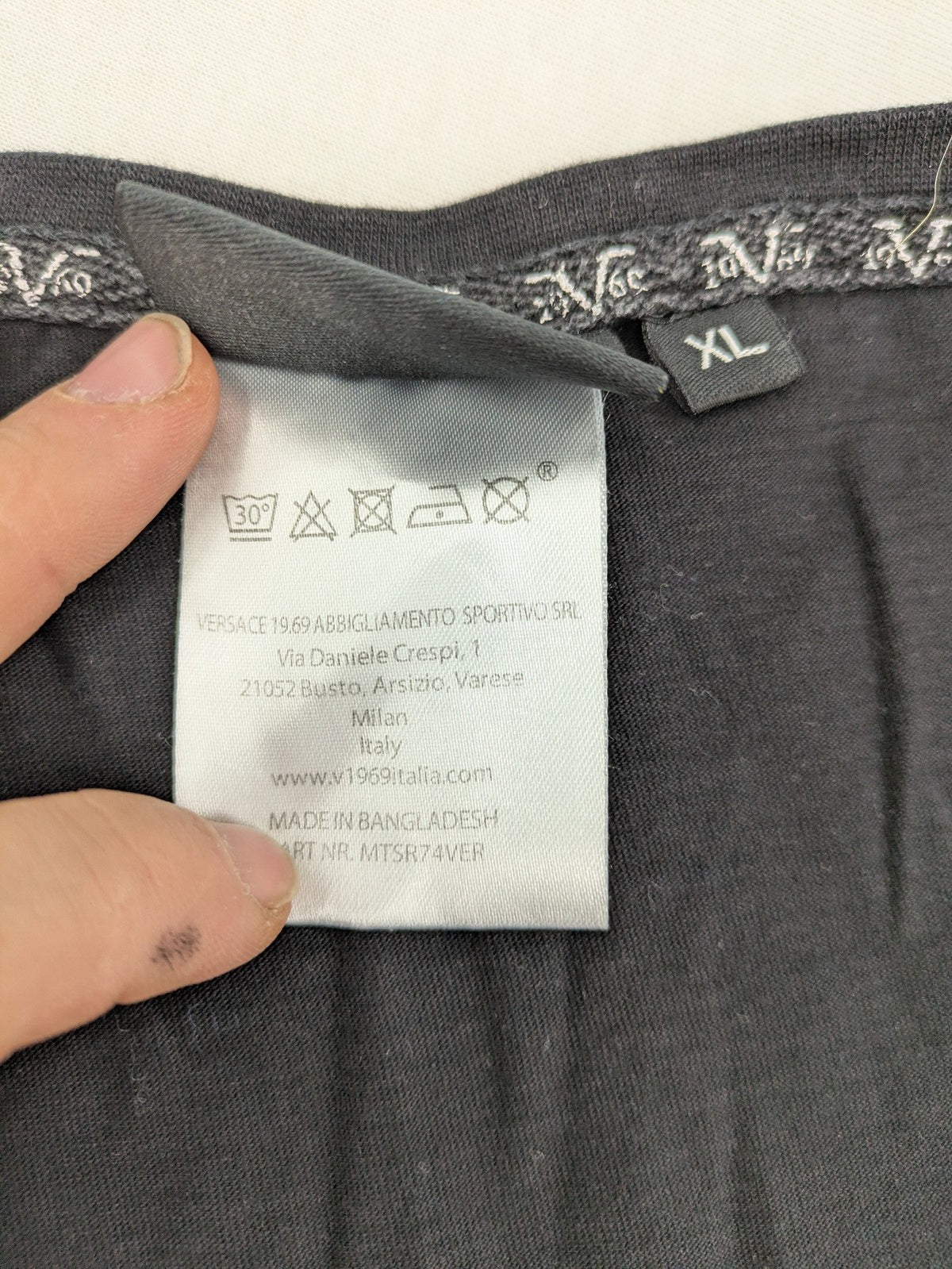 Versace 19.69 black short sleeve t-shirt with graphic logo print and V-neck design.