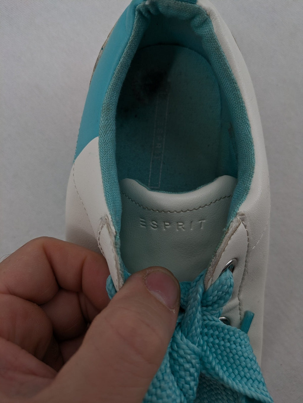Esprit women's sneakers white with turquoise accents and wide laces.