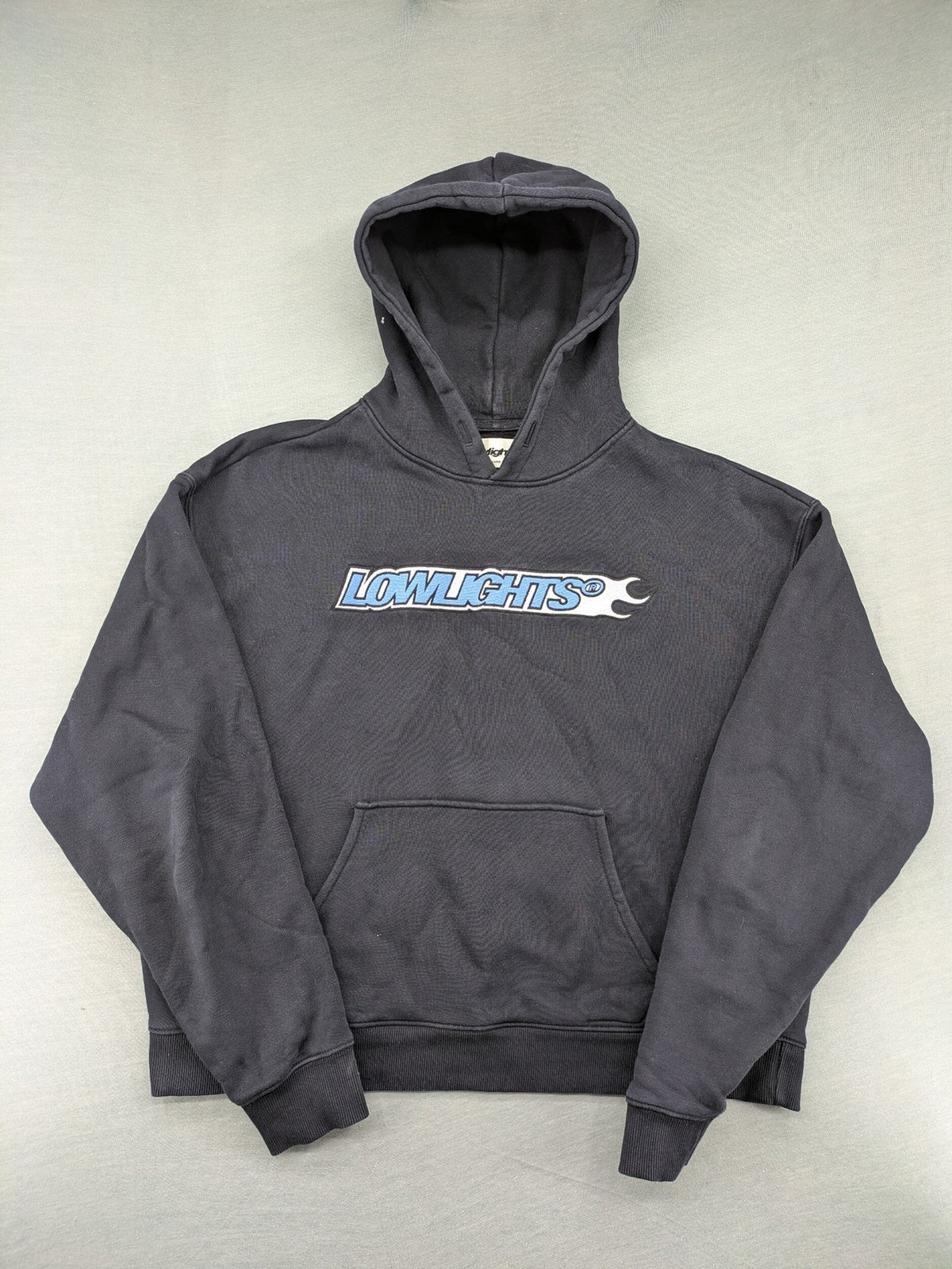 Lowlights Studios grey hoodie with embroidered logo and kangaroo pocket, 100% cotton.