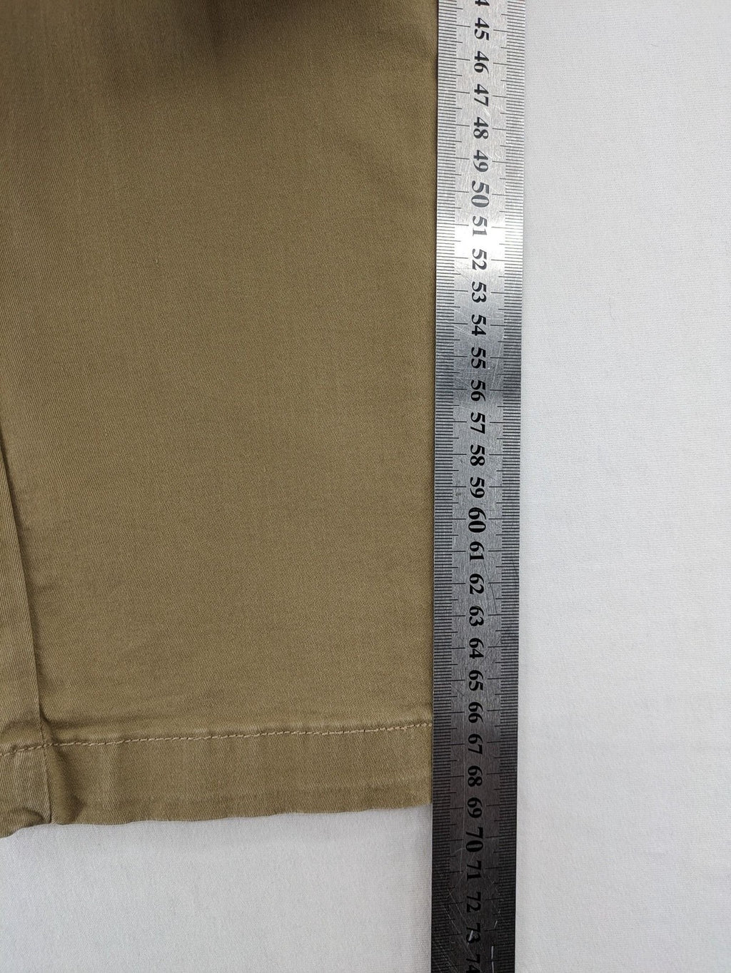 Zara khaki pants with elastic waistband, made from stretch cotton blend for comfort.