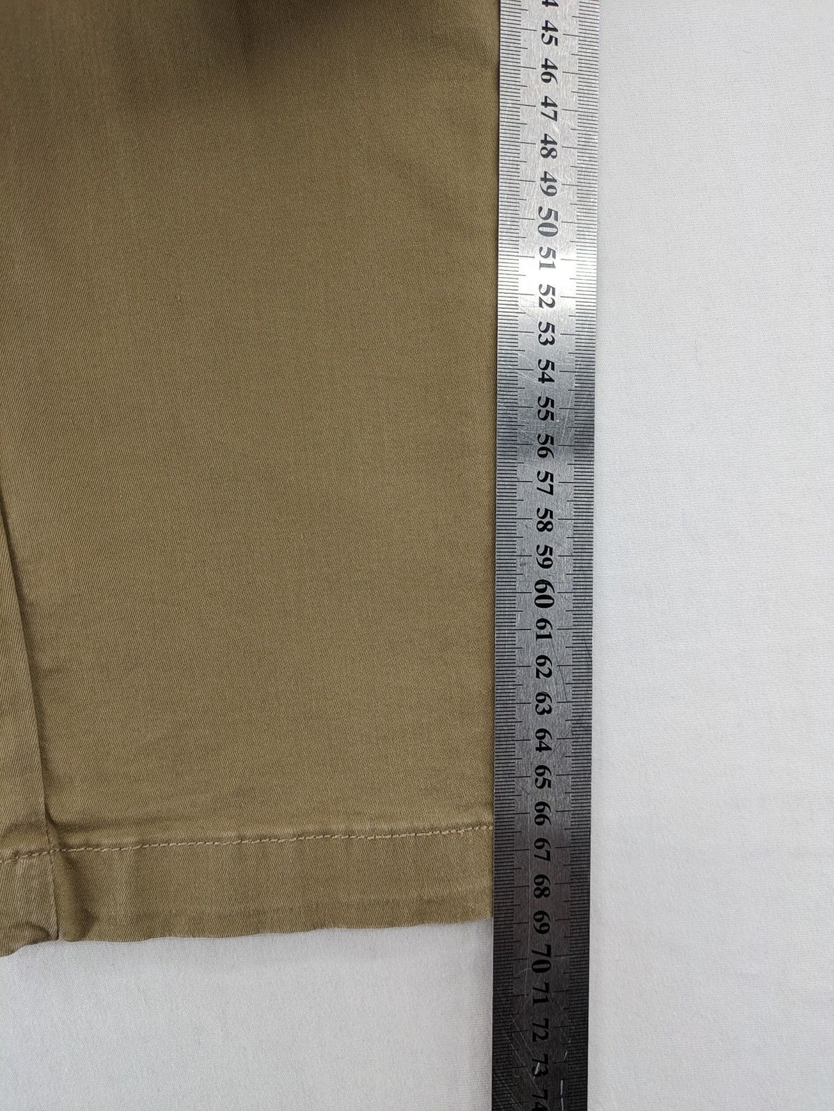 Zara khaki pants with elastic waistband, made from stretch cotton blend for comfort.