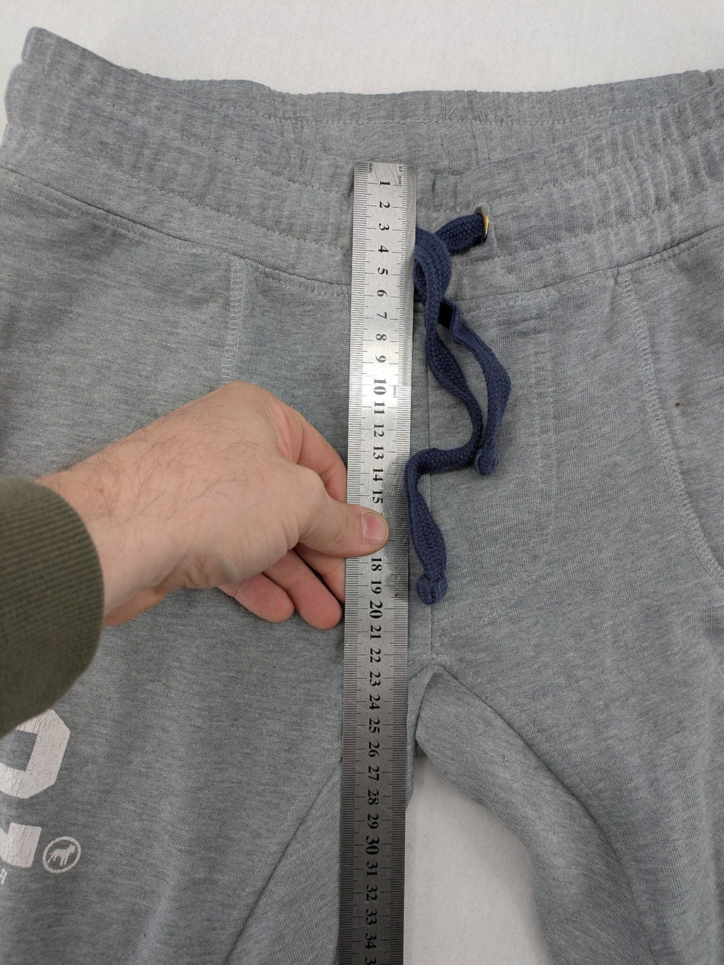Private Baller grey sweatpants with "32" graphic print and blue drawstring.