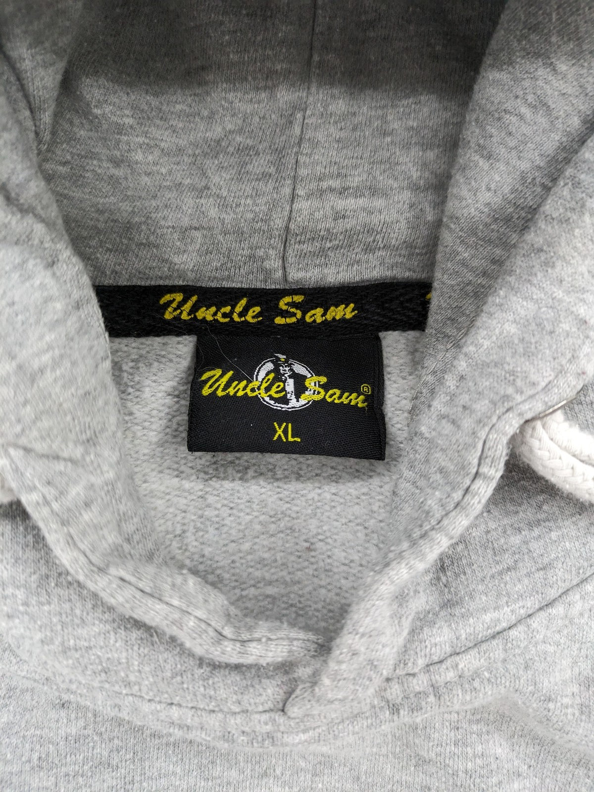 Uncle Sam grey hoodie with logo print, kangaroo pocket, and drawstring hood.