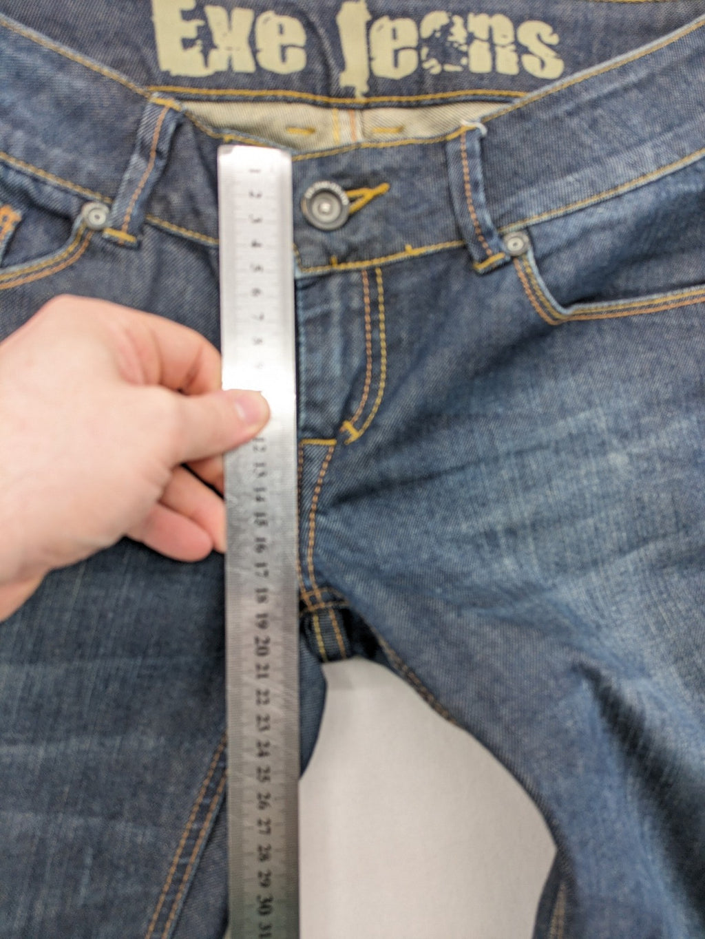 Exe blue straight jeans slim fit bootcut stretch denim with classic 5-pocket styling.