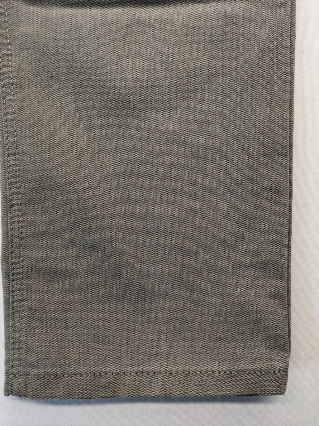 BRAX grey straight jeans 5-pocket design with zipper fly and soft fabric.