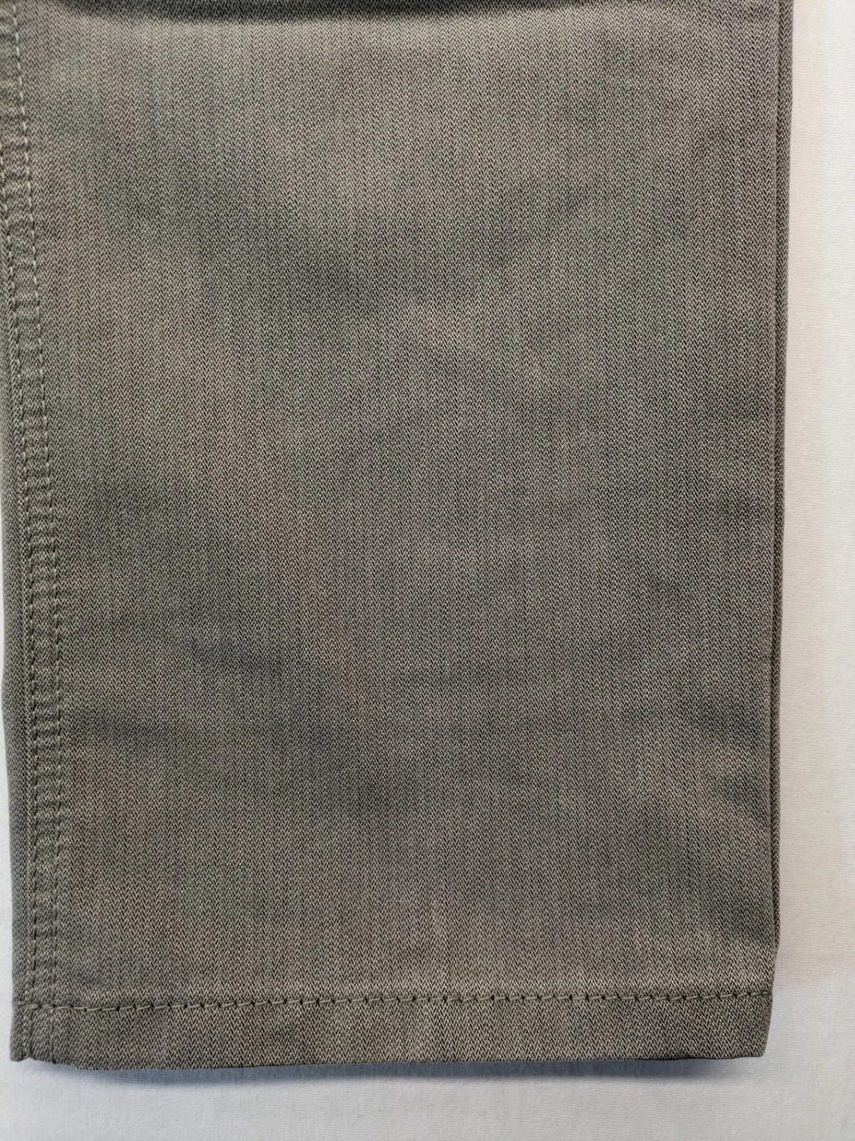 BRAX grey straight jeans 5-pocket design with zipper fly and soft fabric.