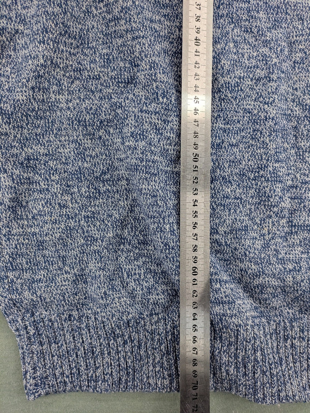 Canda blue-grey melange turtle neck jumper with long sleeves and round neckline.