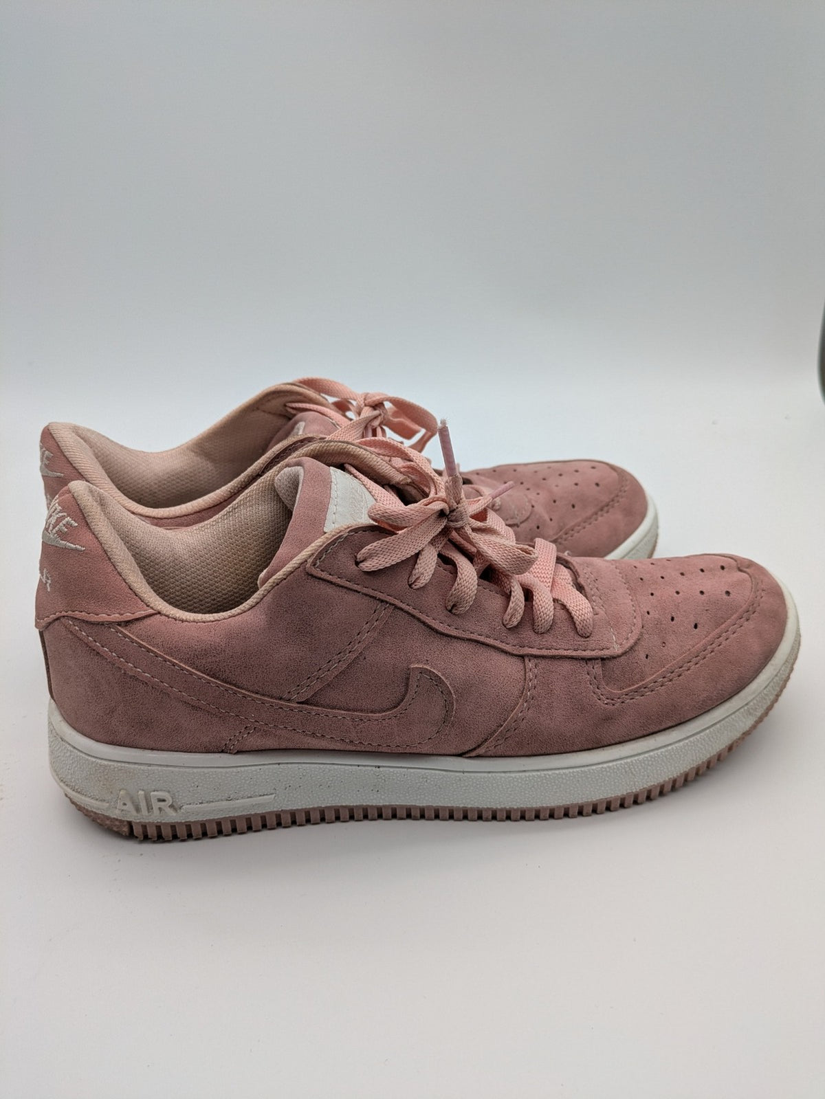 Nike Air Force 1 Low Top pink suede with perforated toe box and white sole