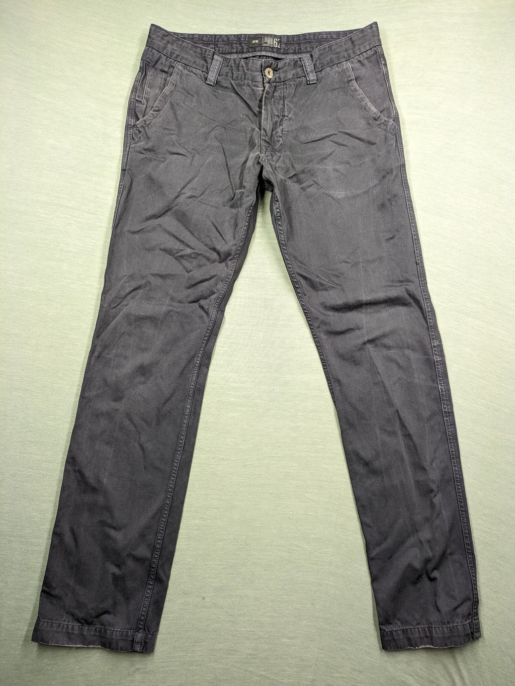 WE pink straight fit pants 100% cotton with zipper fly and belt loops.