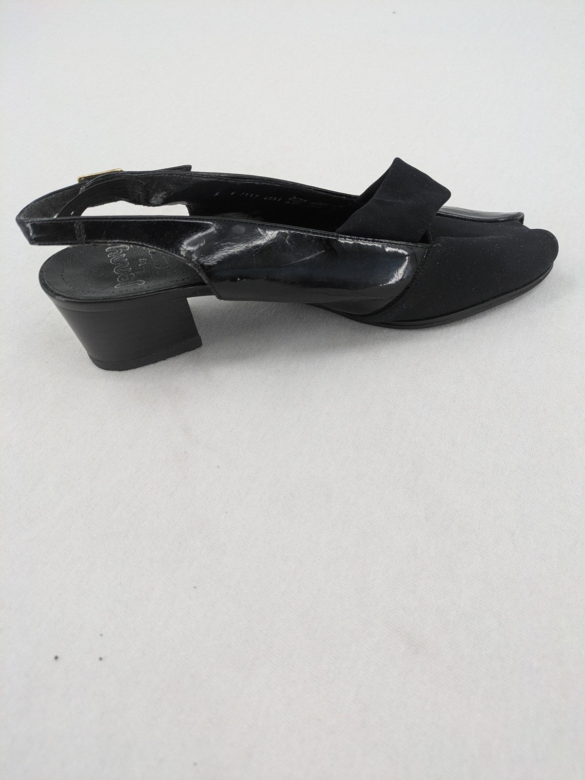 Jenny by Ara black slingback pumps with peep-toe front and glossy finish.
