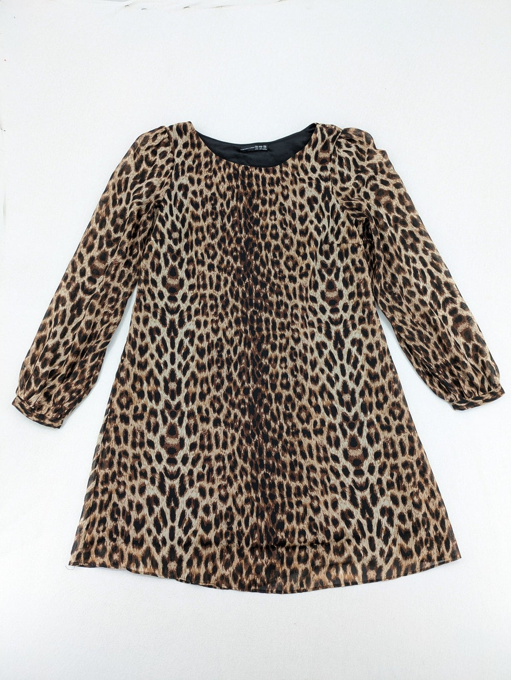 Atmosphere beige leopard print dress with sheer chiffon sleeves and buttoned cuffs.