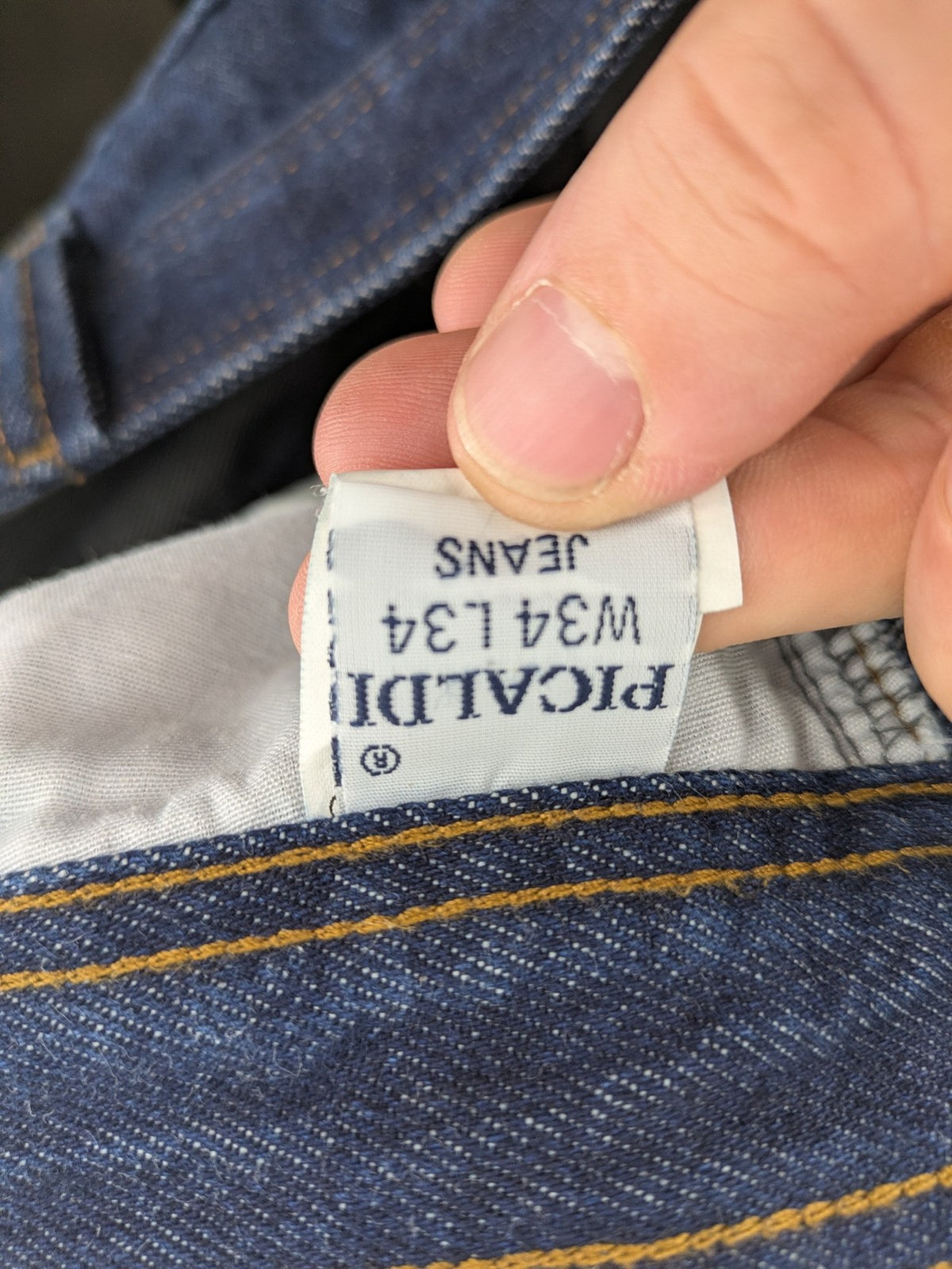 Picaldi blue straight jeans with button fly and frayed hem, 5-pocket design.