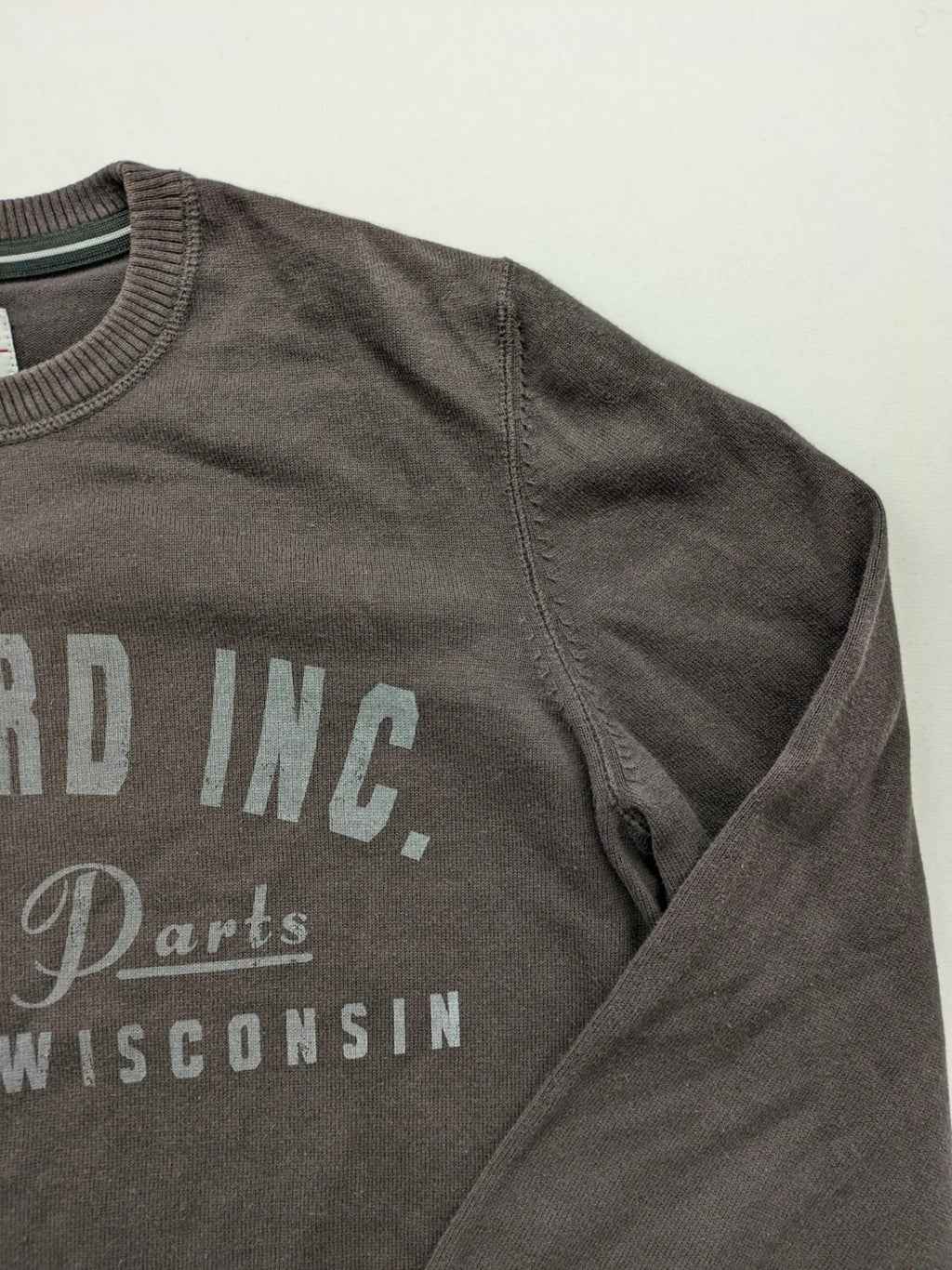 s.Oliver brown turtle neck jumper with "Radford Inc." graphic print and ribbed cuffs.