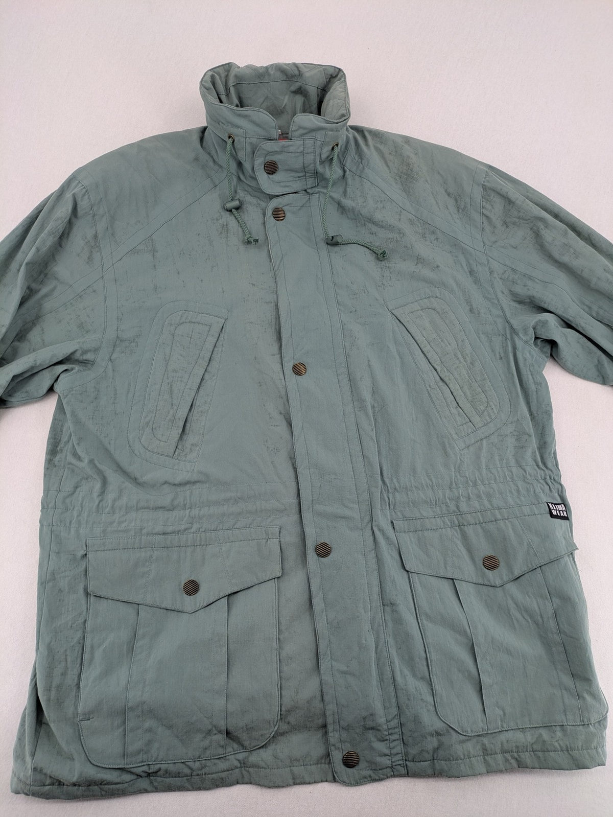 Klima green jacket vintage style, windproof, waterproof, with hidden hood and multiple pockets.