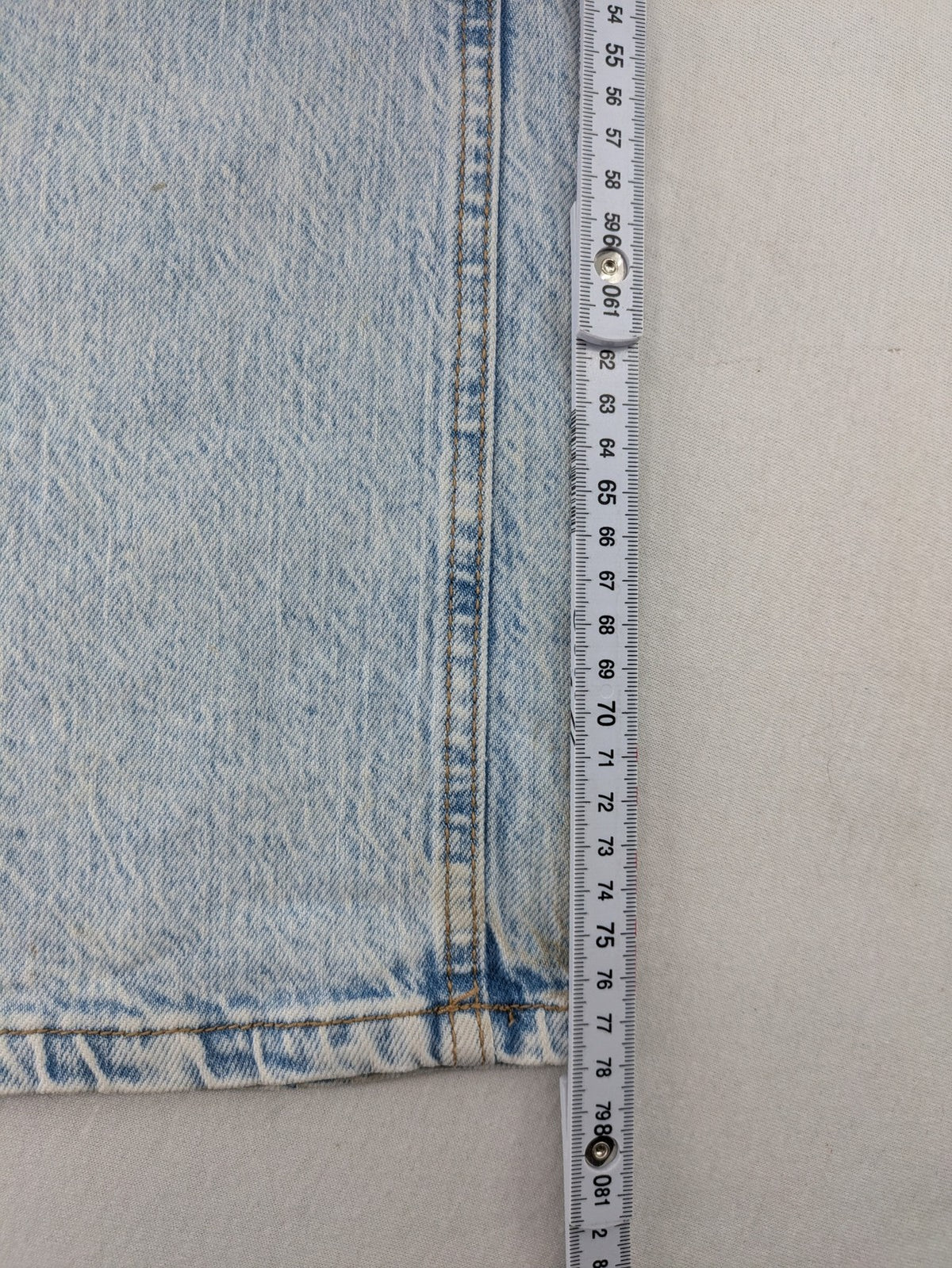Stradivarius blue high waist flare jeans with acid wash and classic five-pocket design.