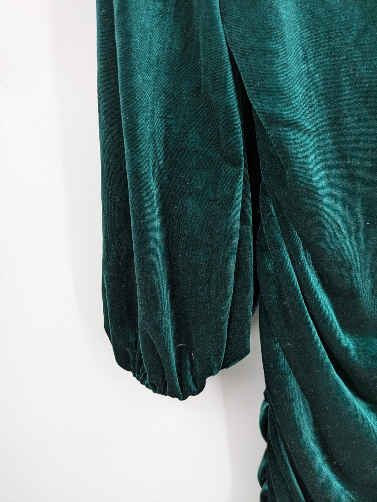 SHEIN green bodycon dress with ruched details, square neckline, and long puff sleeves.