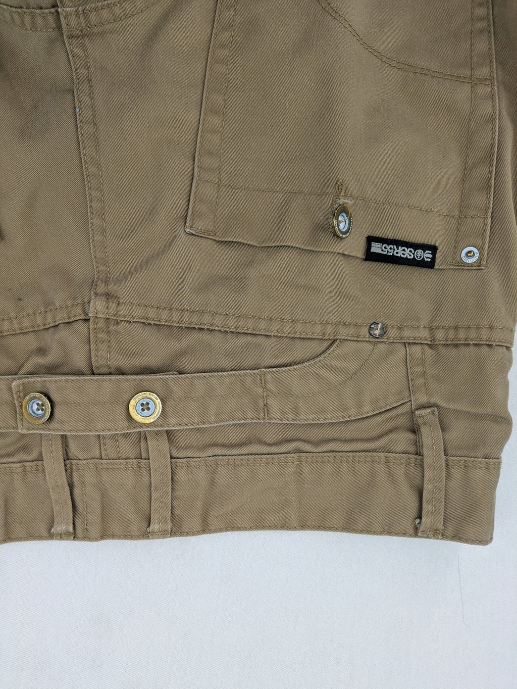 Crosshatch grey cargo pants with multiple pockets and durable cotton-polyester blend.