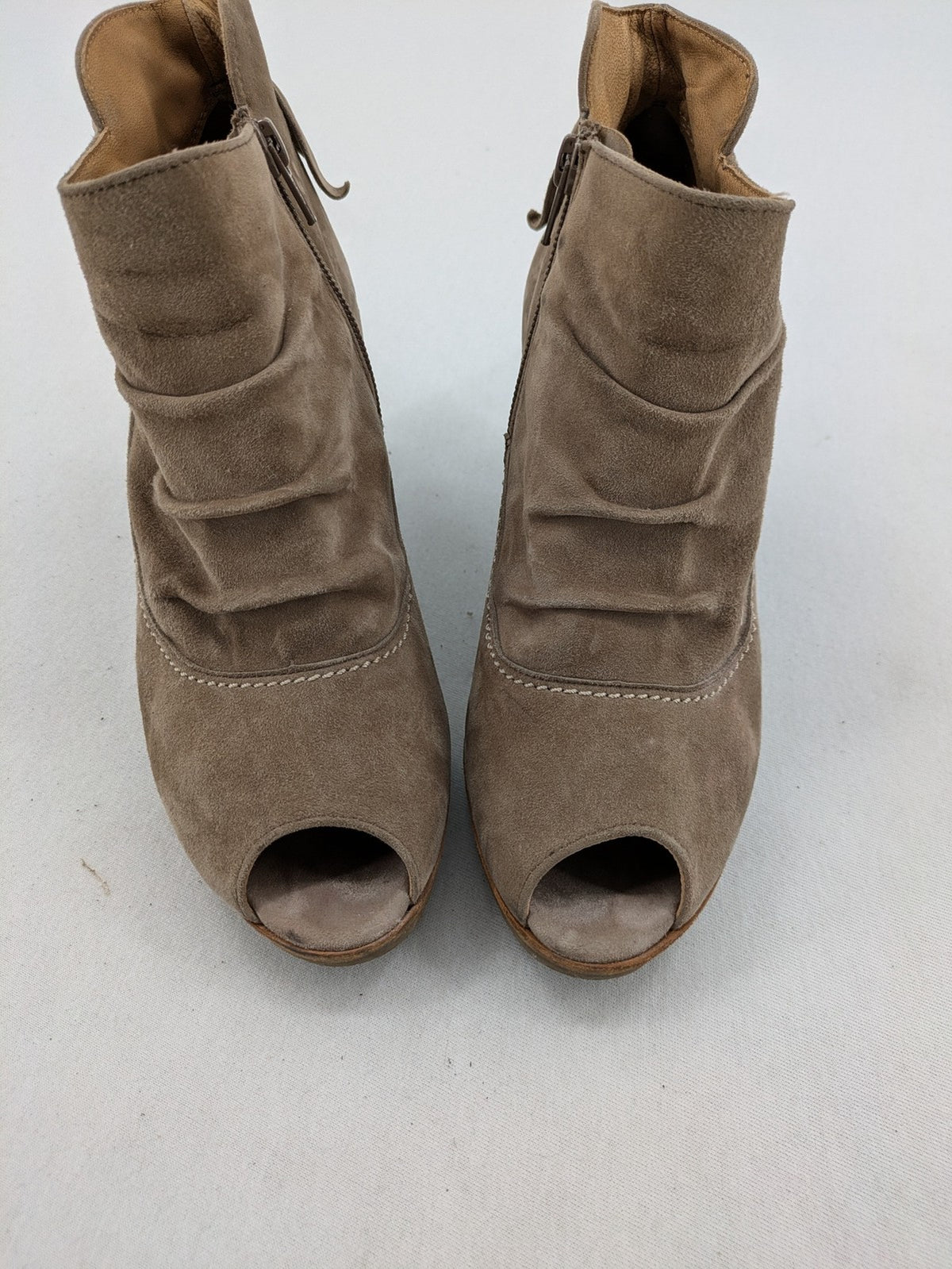 Paul Green taupe suede ankle boots with gathered front, peep toe, and block heel.
