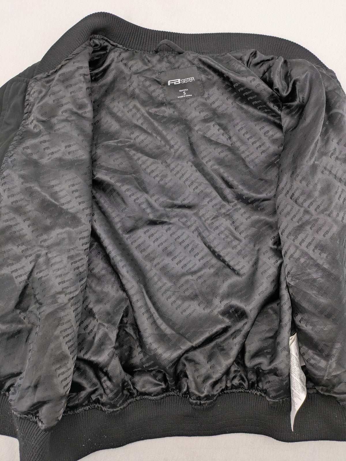 FB Sister grey bomber jacket with full zip, ribbed cuffs, and smooth polyester material.