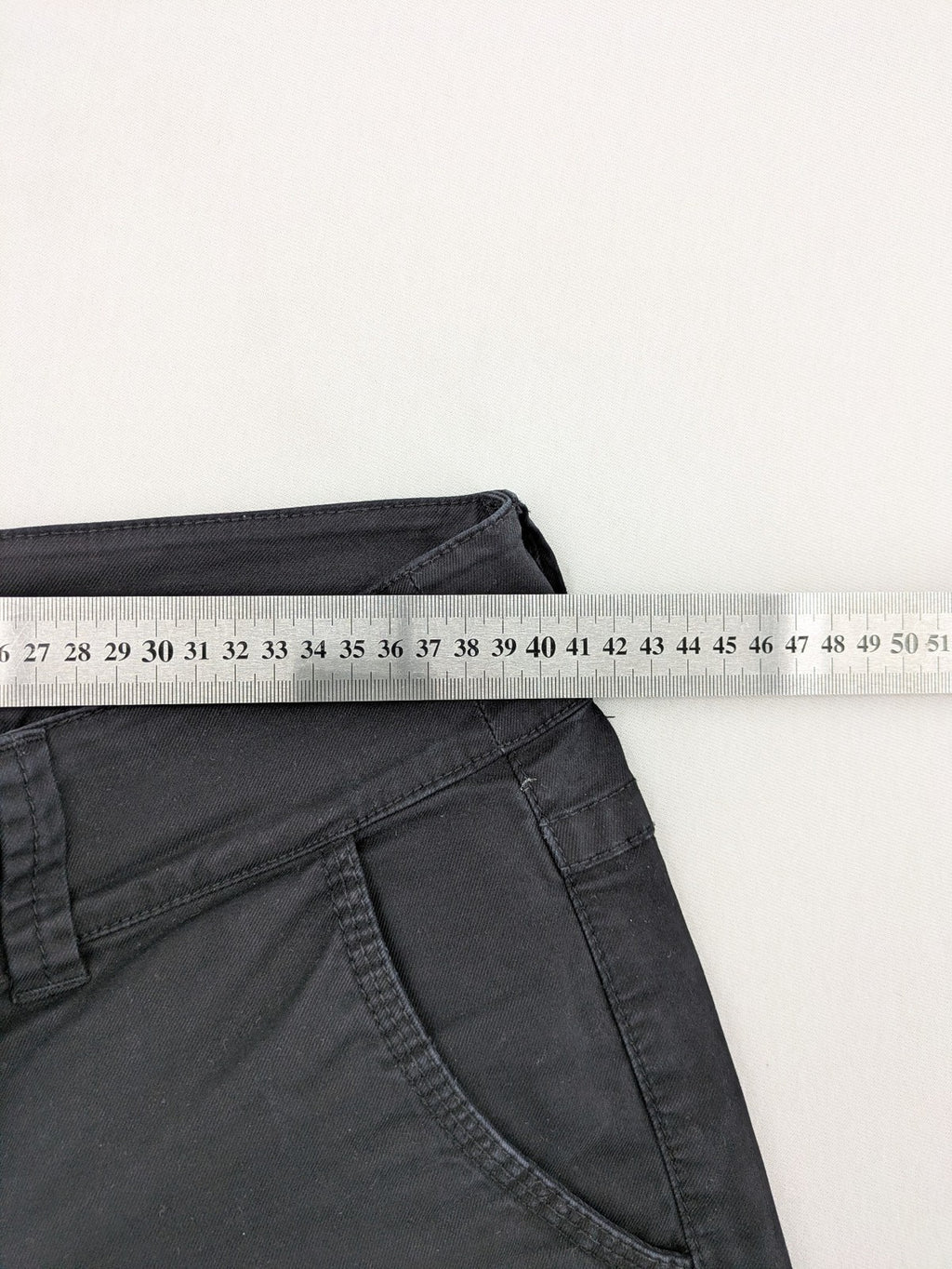 Bernd Berger grey chino pants with double button closure and straight leg design.