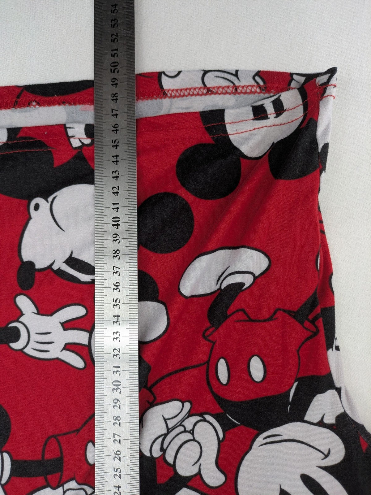 Disney loungewear set red and black with allover Mickey Mouse print and long sleeves.
