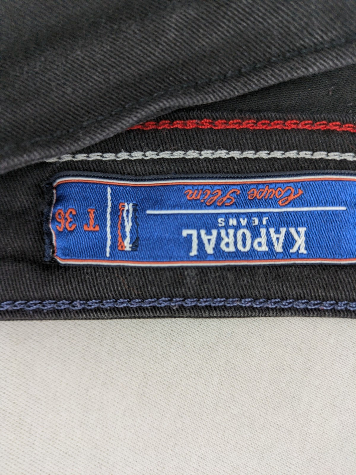 Kaporal black slim fit jeans with classic 5-pocket design and stretch denim material.