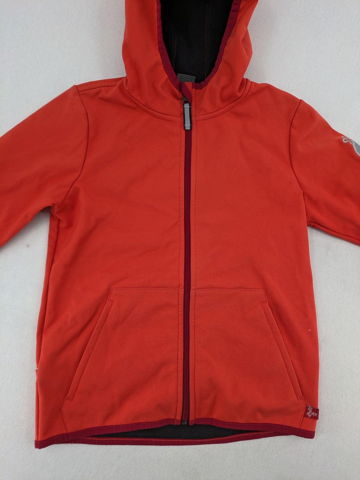 elkline orange softshell coat with fleece lining and elk logo patch