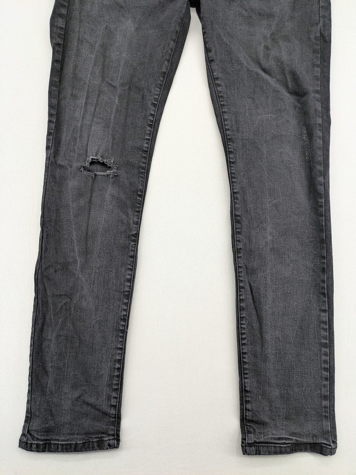 Denim 1982 grey slim fit jeans with ripped knee detail and distressed finish.