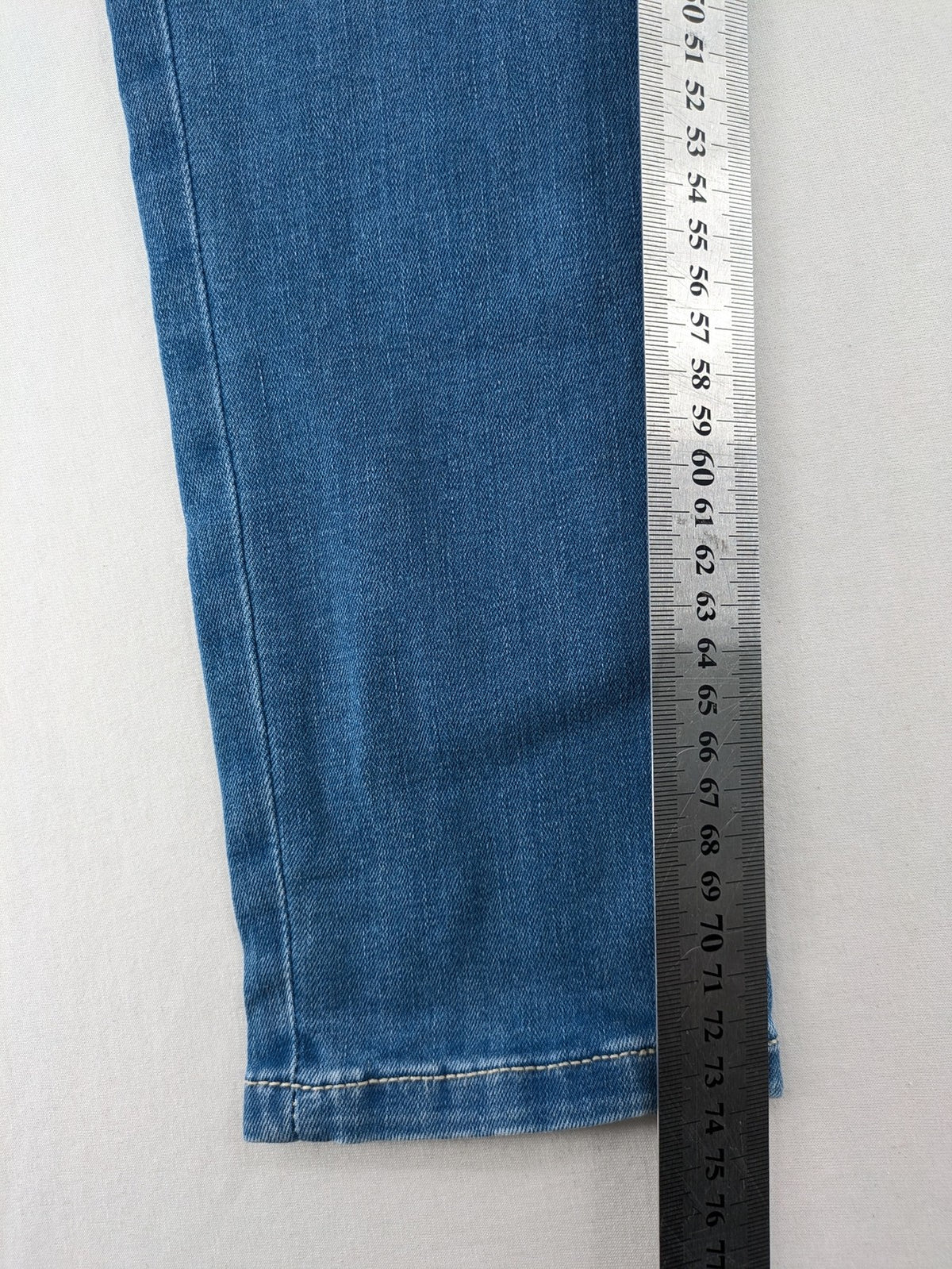 ESMARA blue super skinny jeans with medium waist and stretchy cotton blend material.